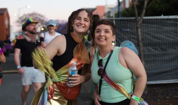 two people smiling together