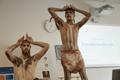 two men performing traditional Aboriginal dance