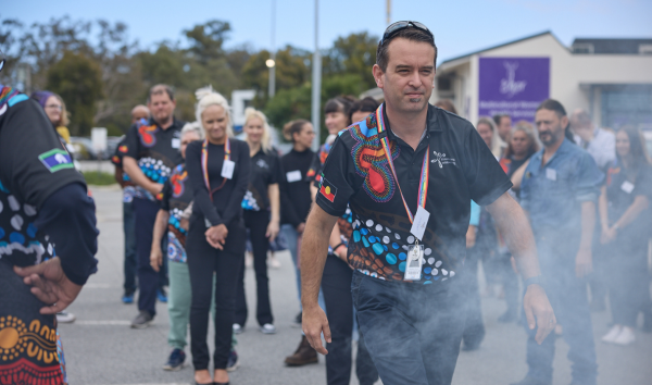 man walking through smoke