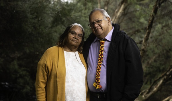 Two Elders standing together